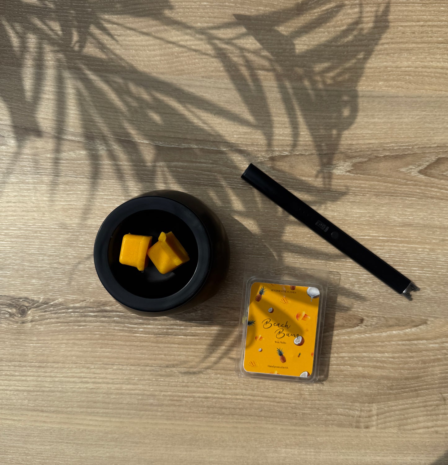 Escape to paradise with Beach Bum — mango, pineapple & coconut wax melts handcrafted in South Africa. Shop Sentimental Flames.